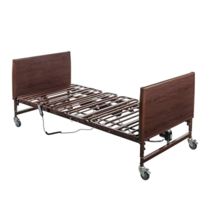Electric hospital bed with wood-grain headboard, adjustable steel frame, and lockable casters for home patient care.
