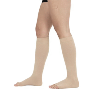Beige open-toe compression socks worn on legs to provide graduated support while keeping toes free.